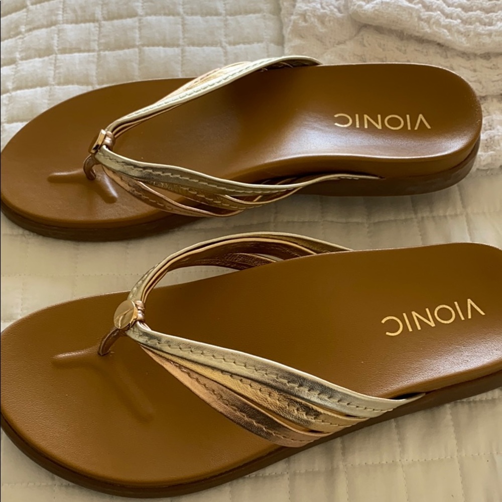 Vionic gold and bronze sandals.